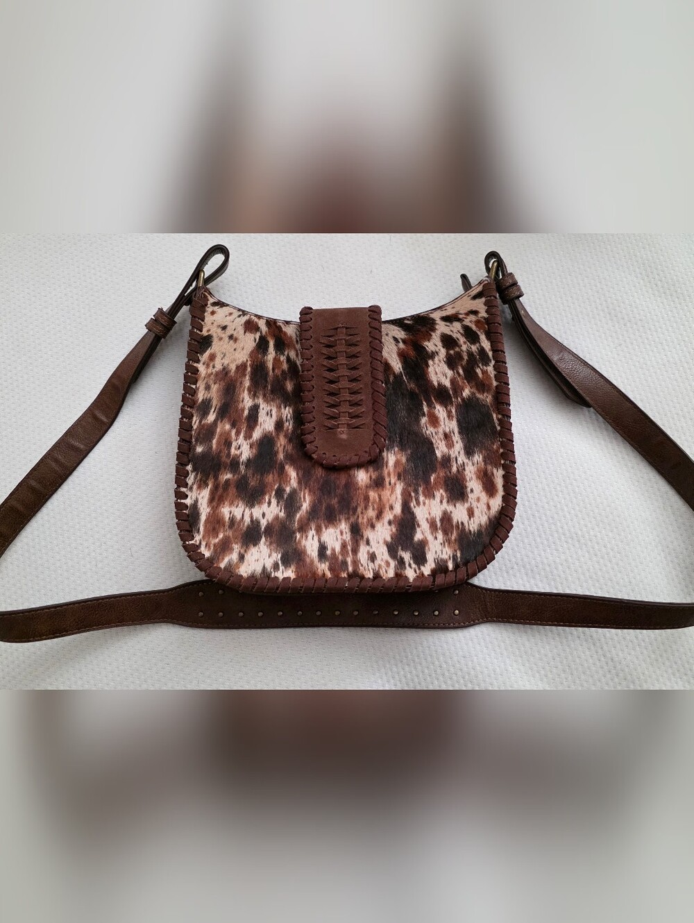Brown Cowhide Crossbody Bag with Whipstitch Detail